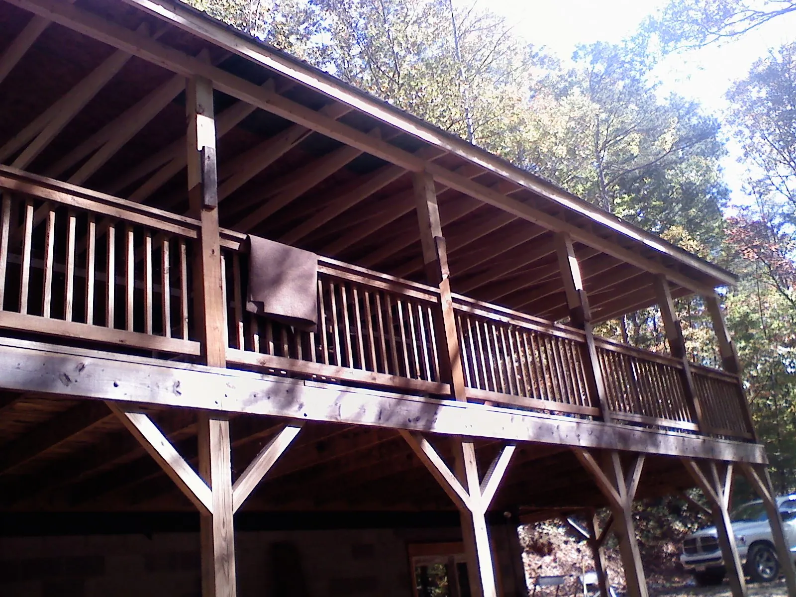 Timber framing under a new elevated porch and deck — Roof Leak Repair in Spring City by Roofing Brothers